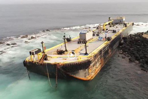 Fuel Removed from Barge That Ran Aground Off San Juan